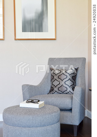 modern living room with pillow on gray armchair modern living room with pillow on gray armchair 24920838