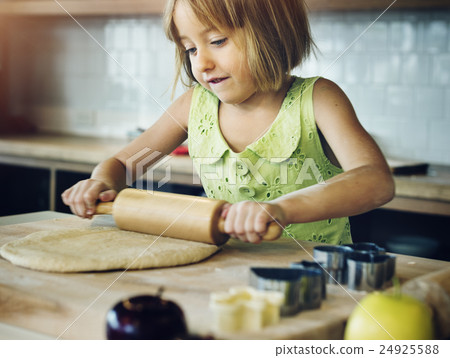 Little Girl Baking Cookies Concept Little Girl Baking Cookies Concept 24925588