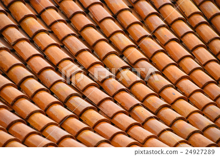 Golden brown glazed Asian antique roof tiling Golden brown glazed Asian antique roof tiling 24927289