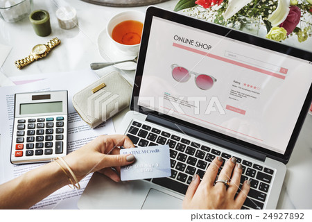 E-shopping Online Shopaholic Paying Credit Card Concept E-shopping Online Shopaholic Paying Credit Card Concept 24927892