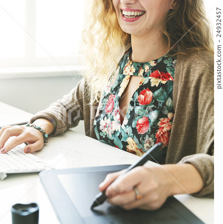 Female Smiling Mousepad Keyboard Workspace Concept Female Smiling Mousepad Keyboard Workspace Concept 24932457