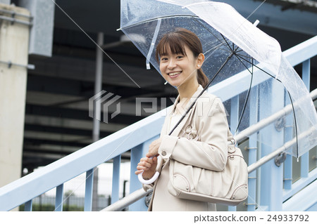 Business woman crossing the steps of the pedestrian overpass Business woman crossing the steps of the pedestrian overpass 24933792