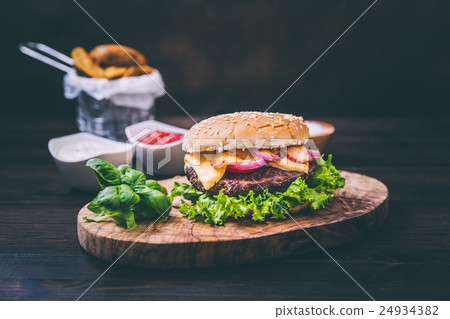 Burger with potato wedges Burger with potato wedges 24934382