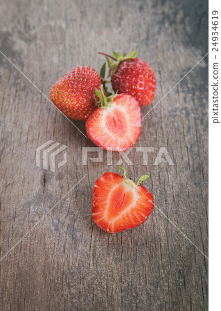 fresh strawberries on wood table 24934619