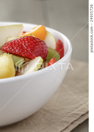 fresh mix fruit salad with strawberry, kiwi and 24935726
