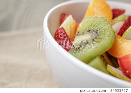 fresh mix fruit salad with strawberry, kiwi and 24935727