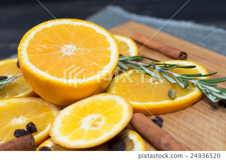 Orange fruit on brown wooden background 24936520