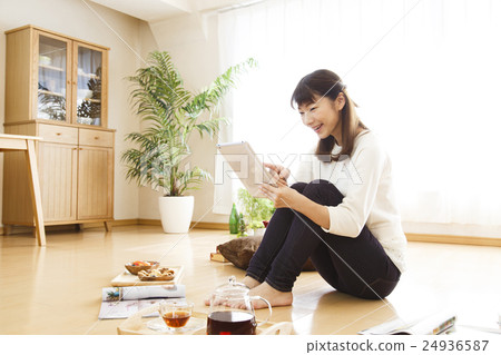Female young lady tablet lifestyle holiday cute casual tea time Female young lady tablet lifestyle holiday cute casual tea time 24936587