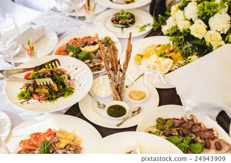 Catering banquet table with different food 24943909