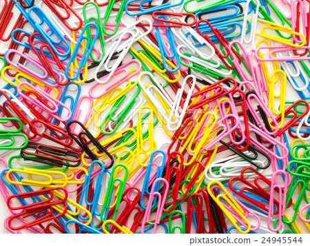 Pile of colorful paper clip on white background Pile of colorful paper clip on white background 24945544