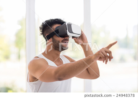 Young Hispanic Man Wear Virtual Reality Digital 24948378
