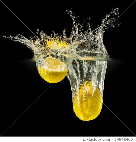Group of fresh fruits falling in water on black Group of fresh fruits falling in water on black 24948460