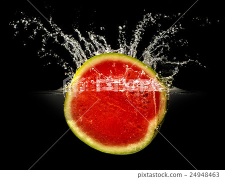 Fresh melon falling in water with splash on black Fresh melon falling in water with splash on black 24948463