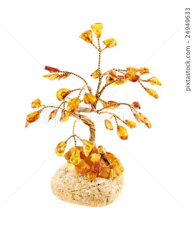 Tree statuette made of amber 24949633