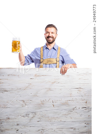 Handsome hipster man holding bear, copy space Handsome hipster man holding bear, copy space 24949773