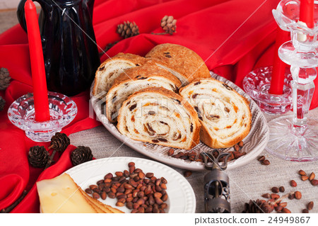 delicious cake on New Year's table with red delicious cake on New Year's table with red 24949867