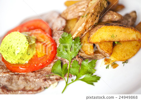 meat and potato slices with butter  24949868