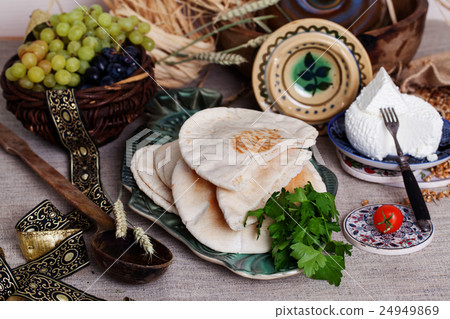thick pita bread in a still life Israeli style thick pita bread in a still life Israeli style 24949869