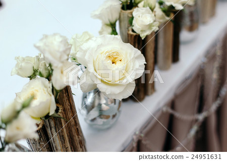 Beautiful decor at the wedding. Flowers on the Beautiful decor at the wedding. Flowers on the 24951631