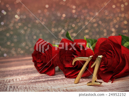 birthday concept with red roses on wooden desk 24952232