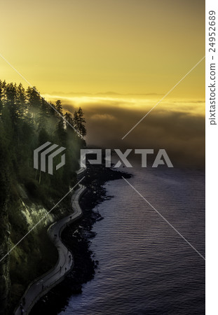 Path by the water at sunset 24952689