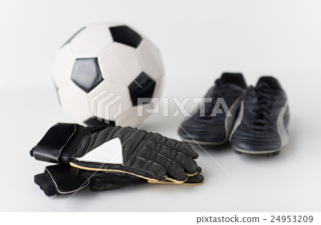 close up of goalkeeper gloves, ball, soccer boots 24953209