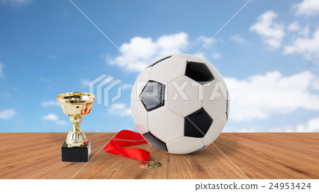 close up of football ball, golden cup and medal close up of football ball, golden cup and medal 24953424