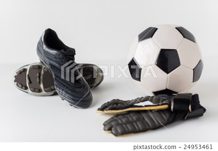close up of goalkeeper gloves, ball, soccer boots 24953461