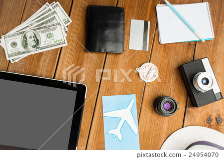 close up of gadgets and traveler personal stuff close up of gadgets and traveler personal stuff 24954070