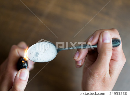 close up of addict preparing crack cocaine drug 24955288