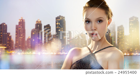 beautiful young asian woman with earring in city beautiful young asian woman with earring in city 24955400