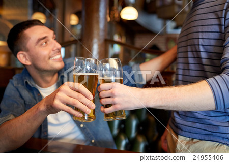 happy male friends drinking beer at bar or pub 24955406