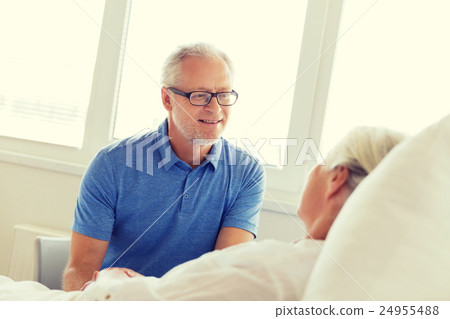 senior couple meeting at hospital ward 24955488