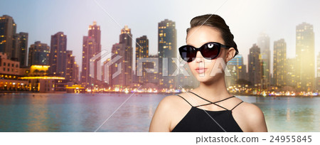 beautiful young woman in elegant black sunglasses 24955845