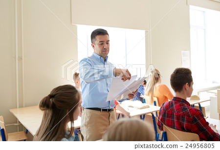 group of students and teacher with test results 24956805