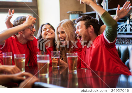football fans or friends with beer at sport bar football fans or friends with beer at sport bar 24957046