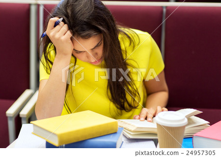student girl with books and coffee on lecture student girl with books and coffee on lecture 24957305
