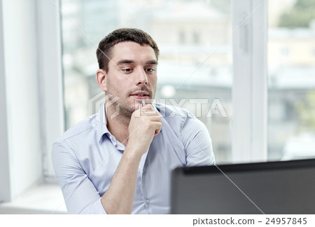 young businessman with laptop computer at office 24957845