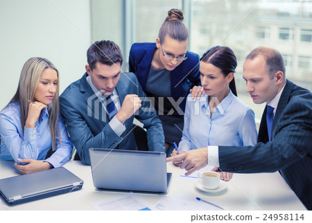 business team with laptop having discussion business team with laptop having discussion 24958114