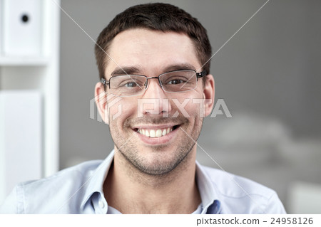 portrait of businessman in eyeglasses at office 24958126