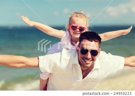 happy family having fun on summer beach happy family having fun on summer beach 24958221