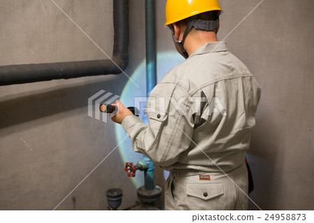 Male to check building piping · Building maintenance Male to check building piping · Building maintenance 24958873