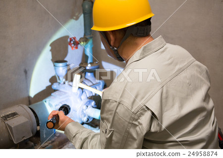Male to check building piping · Building maintenance Male to check building piping · Building maintenance 24958874