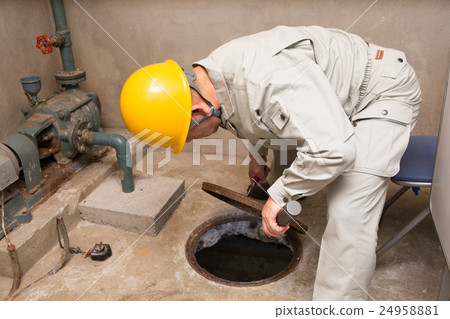 Workers performing maintenance on aged buildings 24958881