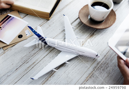 Plane Model Tablet Travel Holiday Concept Plane Model Tablet Travel Holiday Concept 24959798