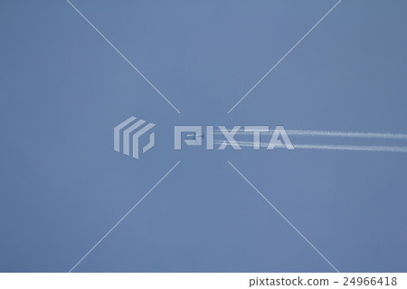 Airplane in the blue sky with condensation trail Airplane in the blue sky with condensation trail 24966418