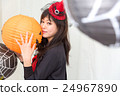 A woman who costumes a Halloween surrounded by a lantern A woman who costumes a Halloween surrounded by a lantern 24967890