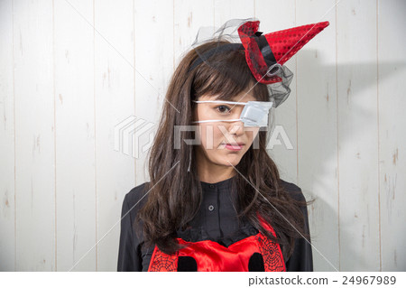 A woman who costumes Halloween A woman who costumes Halloween 24967989