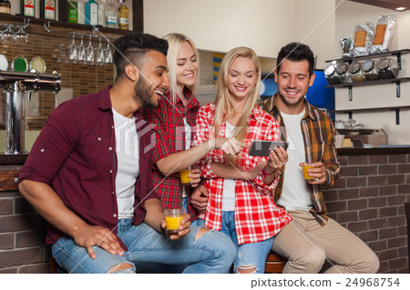 People Friends Using Cell Smart Phone, Drinking 24968754