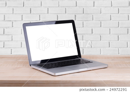 Front view of the laptop is on the work table  24972291